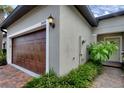 Two-car garage and inviting front entryway at 10490 Echo Dock Loop, San Antonio, FL 33576