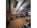 Living room with stone fireplace and hardwood floors at 15222 Lost Lake Ln, Lithia, FL 33547