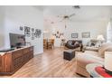 Bright and airy living room with hardwood floors and ample seating space at 13199 Drysdale St, Spring Hill, FL 34609