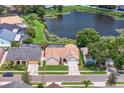 Home near a lake with neighborhood views at 9506 Pebble Glen Ave, Tampa, FL 33647