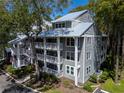 Community building with lake views and multi-level design at 2511 Dolly Bay Dr # 301, Palm Harbor, FL 34684