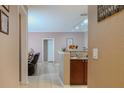 Entryway with view into living room and kitchen at 18001 Richmond Place Dr # 1122, Tampa, FL 33647