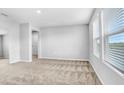 Spacious bedroom with neutral walls and carpeted floors at 5472 Summer Sunset Dr, Apollo Beach, FL 33572