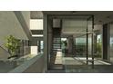 Modern interior with glass walls and a staircase at 1725 Gulf Rd, Tarpon Springs, FL 34689