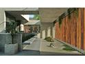 Tranquil zen garden with a stone path and Buddha statue at 1725 Gulf Rd, Tarpon Springs, FL 34689
