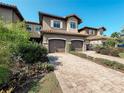 Luxury townhouses with tile roofs and garages at 13506 Messina Loop # 105, Bradenton, FL 34211