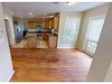 Kitchen with granite countertops and hardwood floors at 905 John Hunter Ct, Brandon, FL 33511