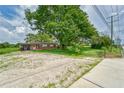 Brick ranch home on a spacious lot with large oak tree at 10912 672 Hwy, Riverview, FL 33579
