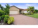 Brick driveway and walkway leading to the house entrance at 5115 Tobermory Way, Bradenton, FL 34211