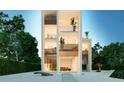 Modern, three-story home with glass and wood accents at 100 Shore Dr, Tarpon Springs, FL 34689