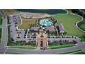 Aerial view of community amenities including pool and clubhouse at 17776 Crescent Moon Loop, Bradenton, FL 34211