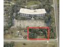 Vacant lot near highway and office building at 8707 127Th Ave, Tampa, FL 33637