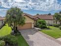 Attractive single-story home with tile roof and landscaped yard at 5243 Esplanade Blvd, Bradenton, FL 34211