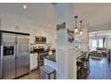 Modern kitchen with stainless steel appliances and granite countertops at 4790 Snook Se Dr, St Petersburg, FL 33705