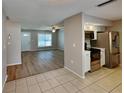 Modern kitchen with stainless steel appliances and white shaker cabinets at 1154 Barbour Ave, Port Charlotte, FL 33948