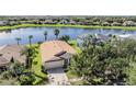 Single-Gathering home with lake view in a quiet residential neighborhood at 11314 Misty Isle Ln, Riverview, FL 33579