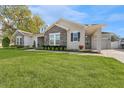 House exterior with stone accents and landscaping at 19859 Sambar Deer Loop, Lutz, FL 33559