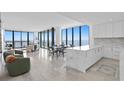 Modern kitchen with white cabinets and marble countertops at 2912 W Santiago St # 2104, Tampa, FL 33629