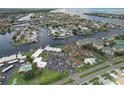 Aerial view of waterfront community, showcasing pools and landscaping at 1028 Apollo Beach Blvd # 4, Apollo Beach, FL 33572