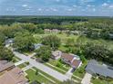 Aerial view showcasing a single-Gathering home with a backyard pool at 4317 Honey Vista Cir, Tampa, FL 33624