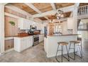 Modern kitchen with white cabinets and granite countertops at 2118 Harbour Watch Dr, Tarpon Springs, FL 34689