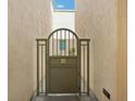Private gated entry to condo unit at 450 Knights Run Ave # 411, Tampa, FL 33602