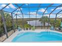 Screened pool area with marsh views, offering a relaxing outdoor space at 4031 Eagle Nest Dr, Hernando Beach, FL 34607