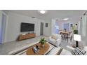 Stylishly furnished living room featuring modern décor, open floor plan, and inviting ambiance at 3908 W Wallace Ave, Tampa, FL 33611