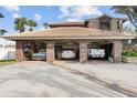 Three-car garage with ample storage space and room for vehicles at 833 Ponce De Leon Dr, Tierra Verde, FL 33715