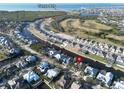 Waterfront community aerial view showcases home's prime location near Tampa Bay with canal access and beautiful surroundings at 617 Islebay Dr, Apollo Beach, FL 33572