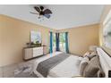 Spacious bedroom with large window and ample natural light at 15635 Bear Creek Dr, Tampa, FL 33624