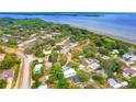Aerial view of a residential neighborhood near the water at 1105 Conant Ave, Safety Harbor, FL 34695