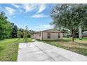 Newly built home with a large backyard and driveway at 4925 69Th N St, St Petersburg, FL 33709