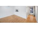 Bright dining room with light wood floors and pass-through kitchen at 19029 Us Highway 19 N # 6-19, Clearwater, FL 33764