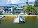 Stunning waterfront property with private dock and boat at 833 Bay Point Dr, Madeira Beach, FL 33708