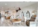 Open living room with high ceilings and neutral color scheme at 833 Bay Point Dr, Madeira Beach, FL 33708