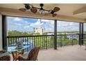 Relaxing balcony with outdoor seating and stunning water views at 11590 Shipwatch Dr # 548, Largo, FL 33774