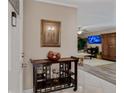 Bright and airy entryway with decorative console table at 12760 Indian Rocks Rd # 510, Largo, FL 33774
