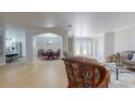 Open floor plan view of the dining room and kitchen, with an elegant table setting and seating at 411 Harbor View Ln, Largo, FL 33770