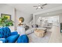 Bright and airy living room seamlessly connects to the dining area at 2510 W Cleveland St # 2, Tampa, FL 33609
