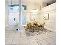 Bright dining area with a table and four chairs at 6515 Virginia Xing, University Park, FL 34201