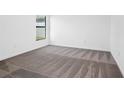 Spacious bedroom with neutral-toned carpeting at 13064 Meadow Swallow Ave, Weeki Wachee, FL 34614