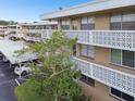 Apartment building with covered parking and landscaping at 5095 Bay Ne St # 306, St Petersburg, FL 33703