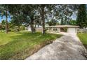 Spacious lot with mature trees and driveway at 7051 Hibiscus S Ave, South Pasadena, FL 33707