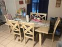 Dining room with table and chairs, perfect for everyday meals at 9463 Arbol Ct, Largo, FL 33773