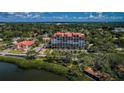 Aerial view showing building location near waterfront and park at 7037 Sunset S Dr # 602, South Pasadena, FL 33707