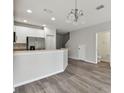 Modern kitchen with stainless steel appliances and light-colored cabinetry at 20461 Berrywood Ln, Tampa, FL 33647