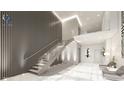 Elegant two-story lobby with modern staircase and seating at 411 E Shore Drive # 213, Clearwater Beach, FL 33767