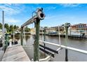 Close up view of a private boat lift at 528 Islebay Dr, Apollo Beach, FL 33572