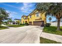 Two-story house with double garage at 10820 Carloway Hills Drive, Wimauma, FL 33598